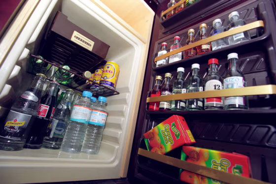 Don't touch&nbsp;your minibar. Many hotels have minibars that track inventory through automatic sensors and may charge you if you simply pick up a chocolate bar and put it back down.